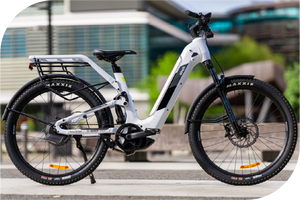 White electric bicycle with black tires on a blurred background