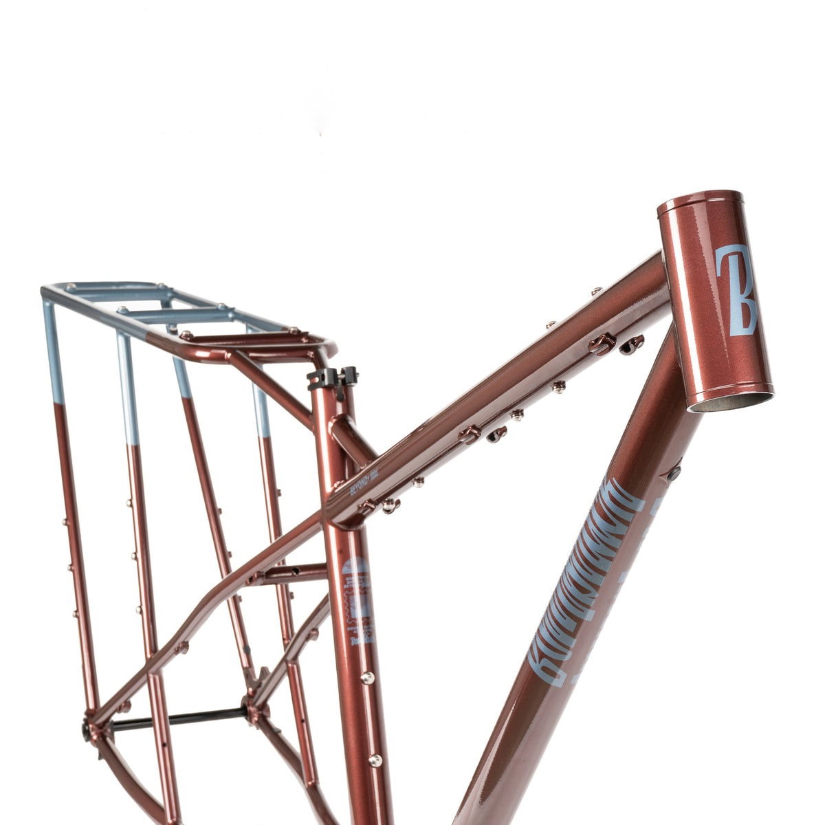 Bombtrack Beyond+ Midtail metallic burgundy frame, head tube and integrated rear rack detail