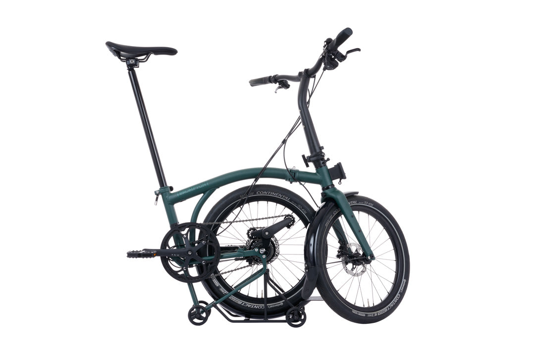 Brompton G Line Green folding bicycle on a white background