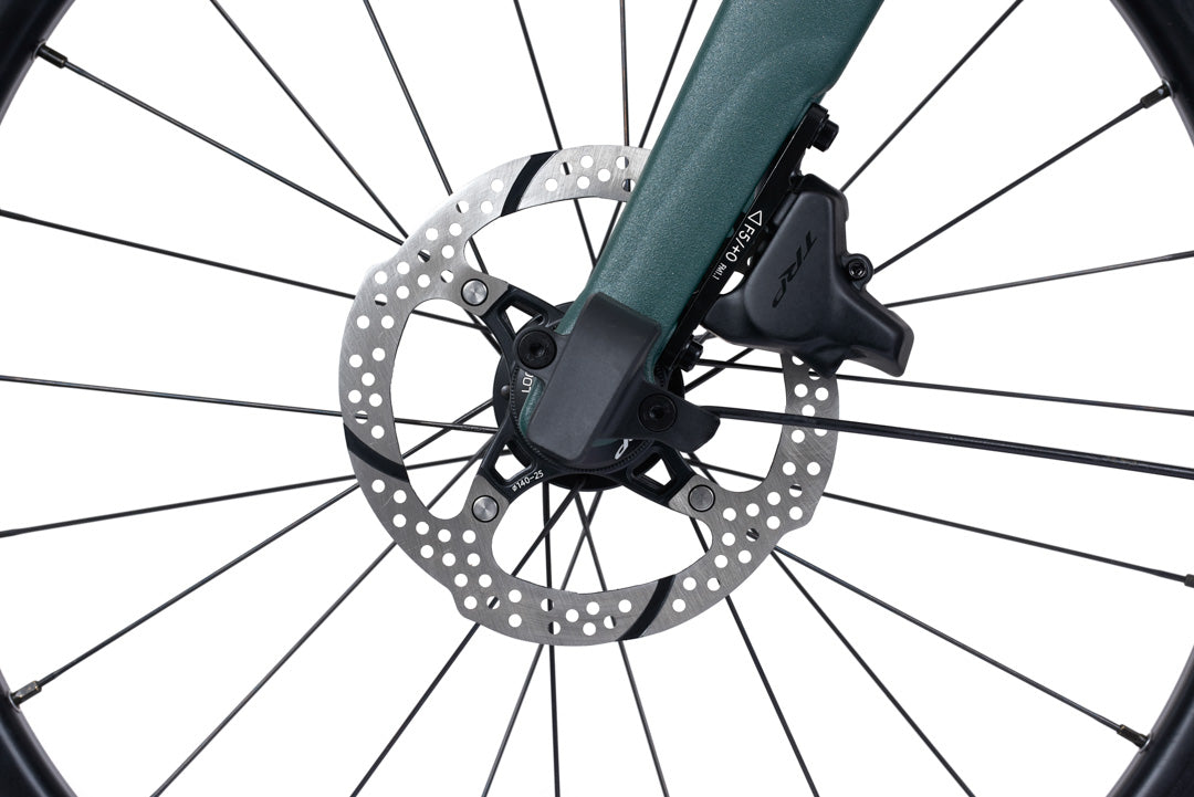 Brompton G Line Close-up of a bicycle wheel with disc brake system on a white background