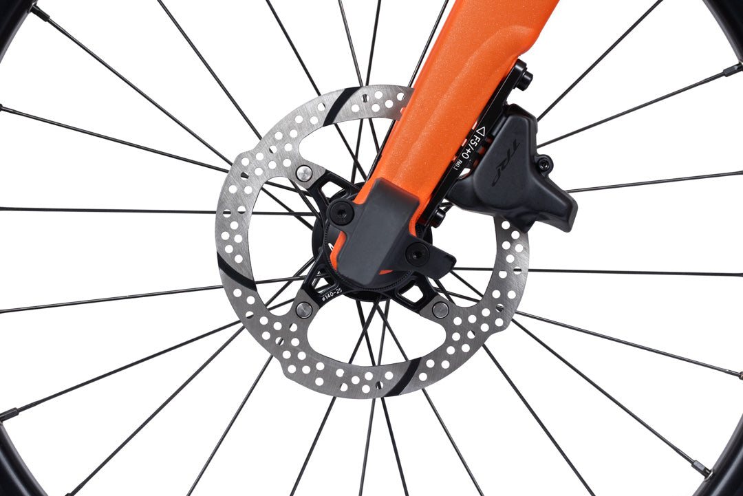 Brompton G Line Close-up of a bicycle wheel with disc brake system on a white background