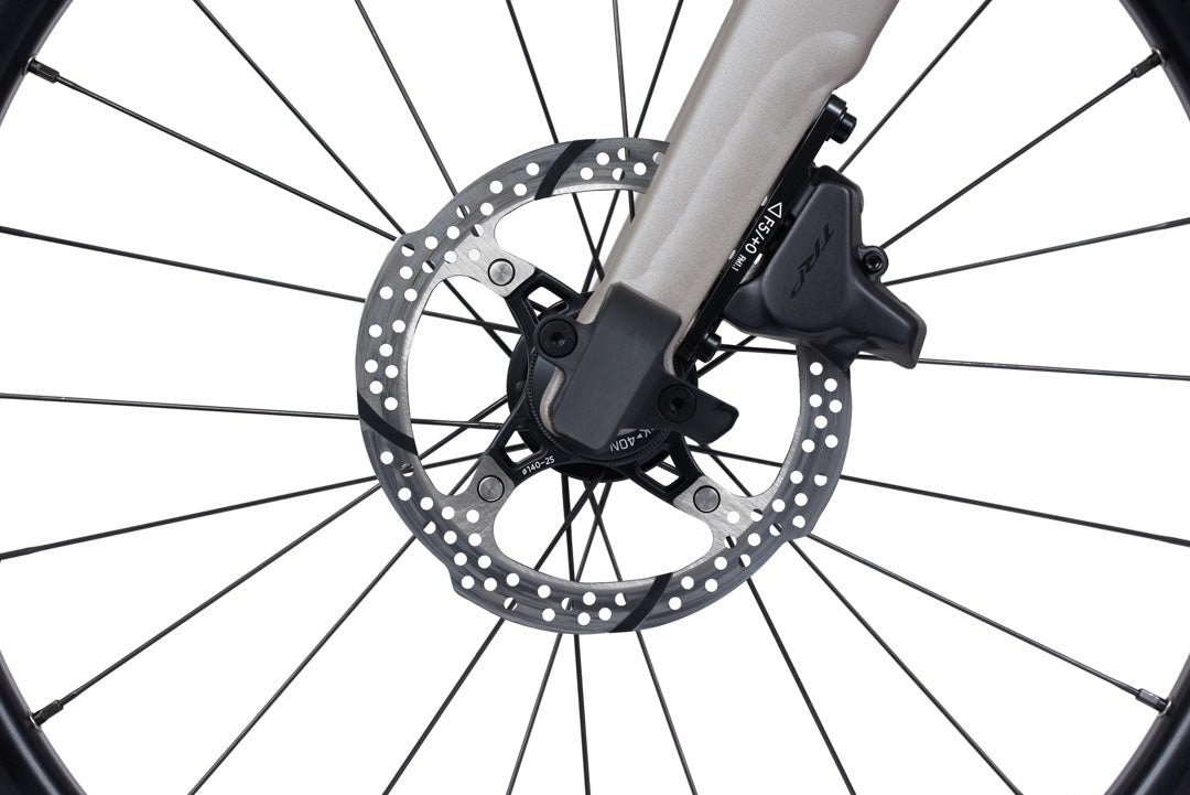 Brompton G Line. Close-up of a bicycle wheel with disc brake system on a white background