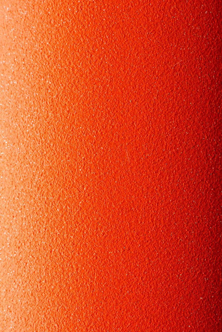 Brompton G Line Close-up of a textured orange surface