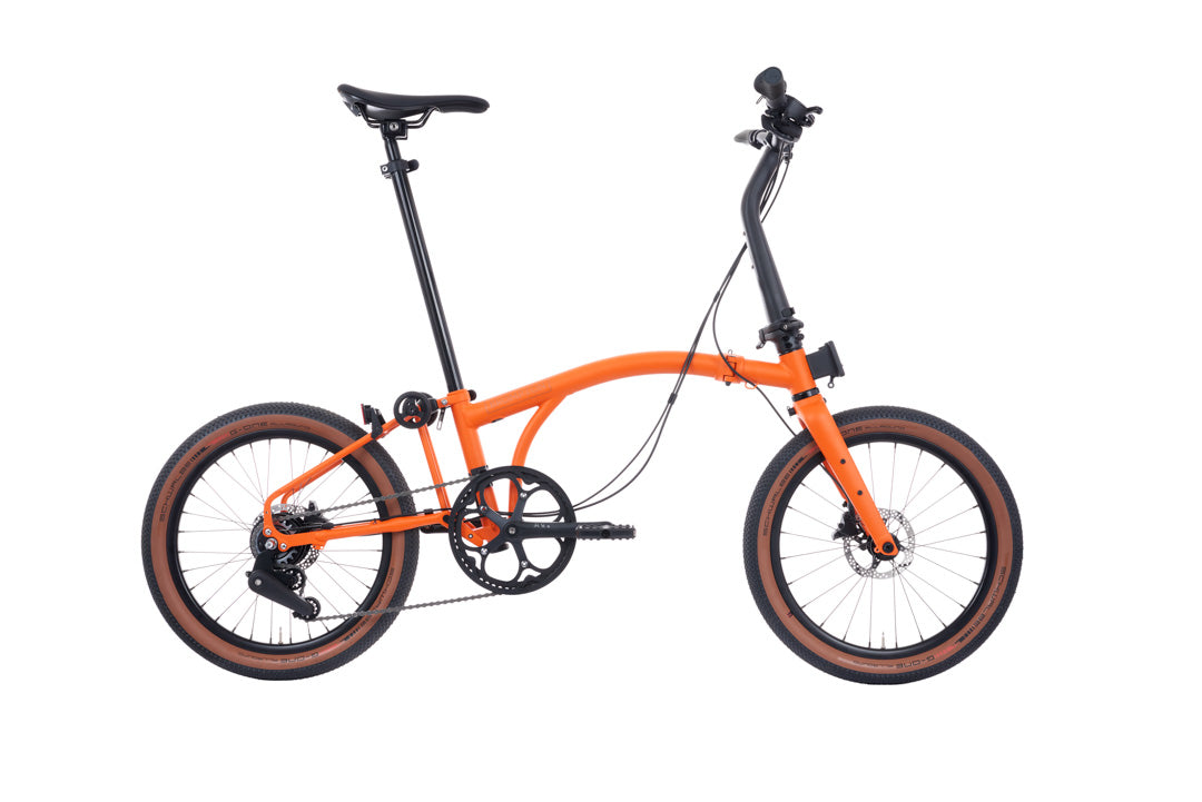Brompton G Line Orange folding bicycle on a white background