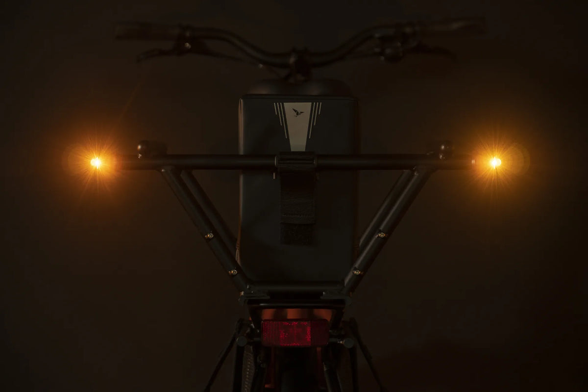 Tern Nitelite Side amber lights mounted on a Clubhouse Mini. Bike and carrier sold separately.