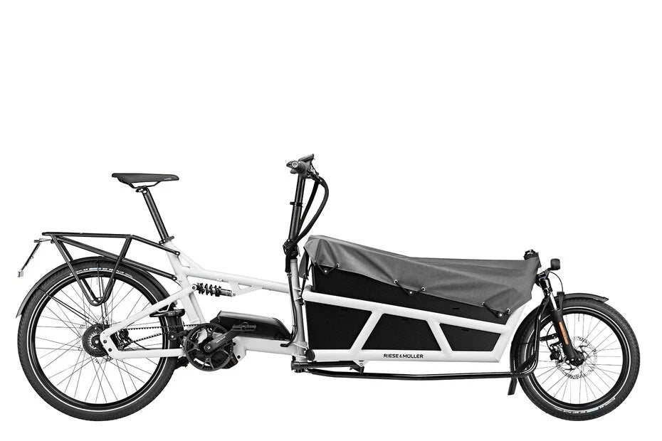 Electric cargo bike with a black cover on a white background