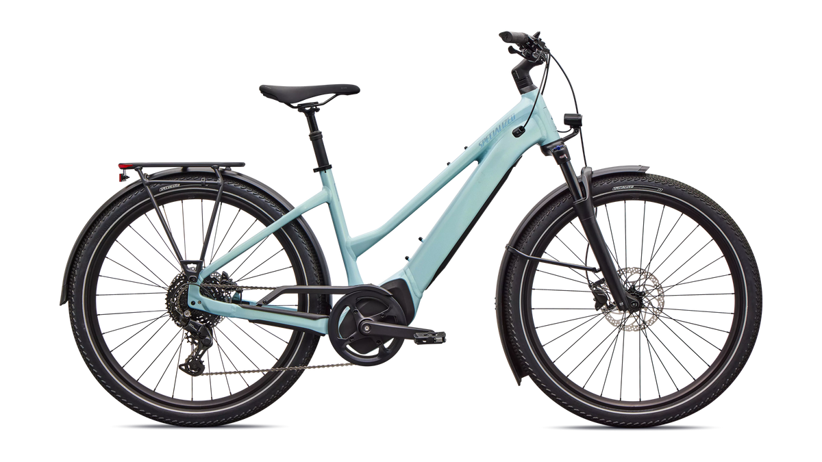 Light blue electric bicycle on a white background