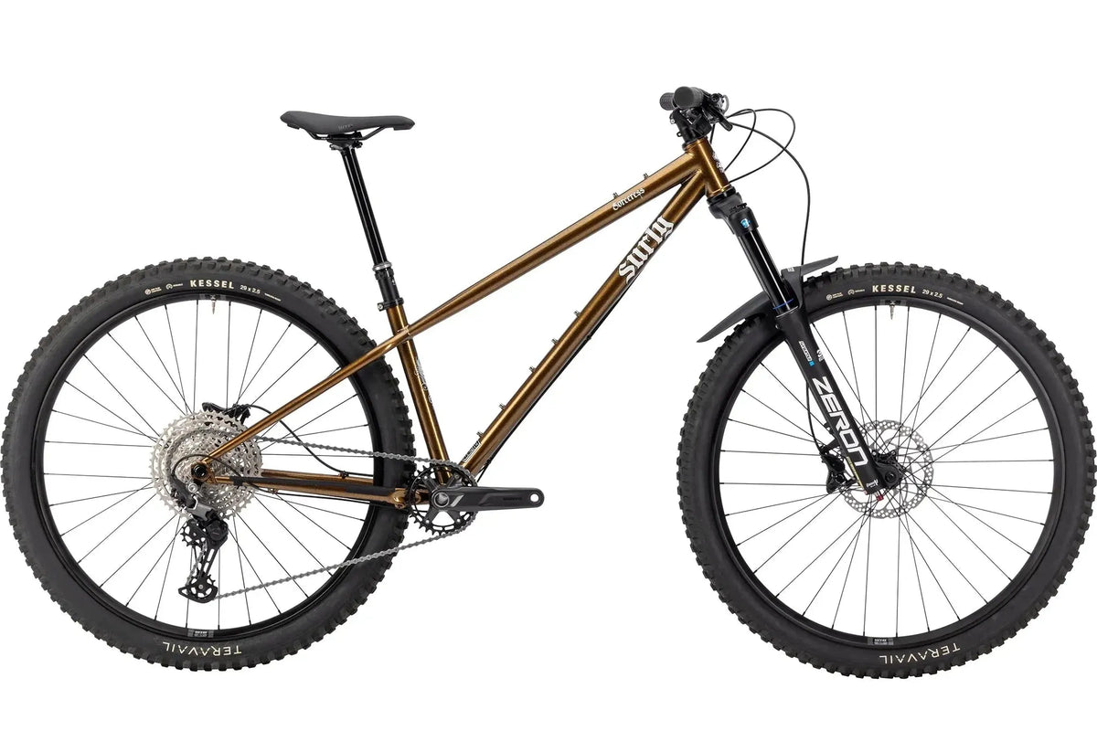 Mountain bike with a brown frame and black components on a white background