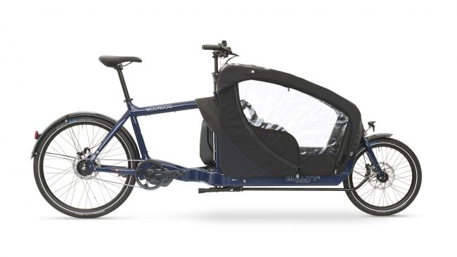 Side by side bicycle with canopy outlet